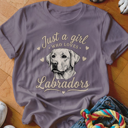 A purple t-shirt featuring a Labrador graphic and text that reads "Just a girl who loves Labradors."