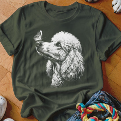 Dark green t-shirt featuring a white sketch graphic of a poodle looking at a butterfly.