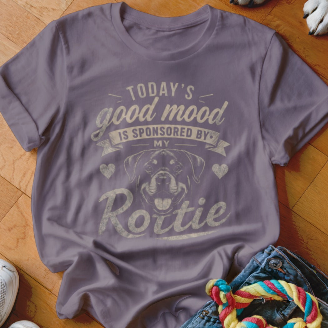 Purple t-shirt with "Today's good mood is sponsored by my Rottie" graphic.