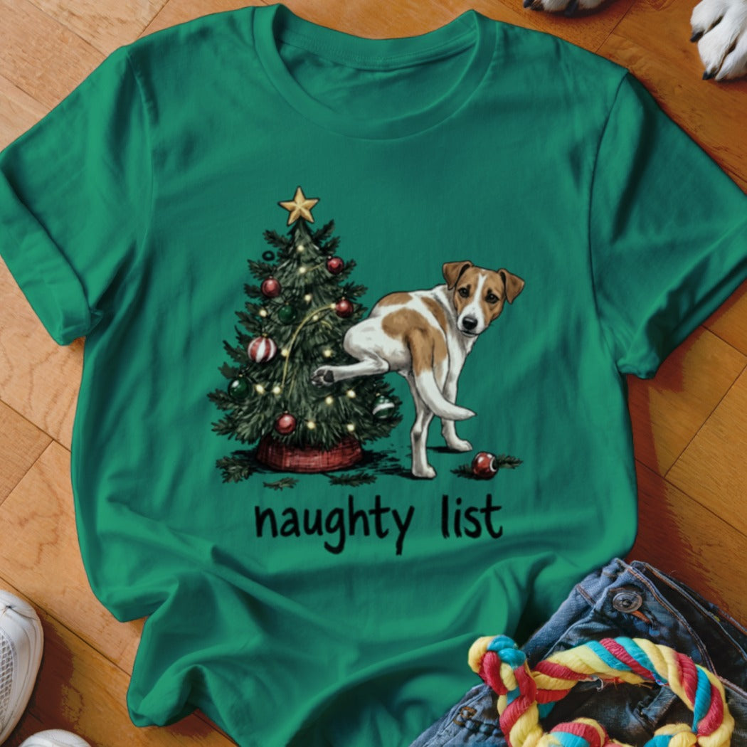 Green t-shirt with a dog lifting its leg on a Christmas tree, reading "naughty list".