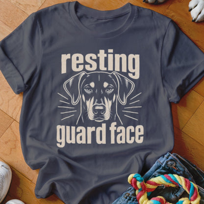 T-shirt with a graphic of a dog's head and the text "resting guard face."
