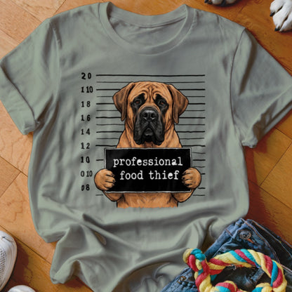 Mastiff dog mugshot with sign reading "professional food thief".