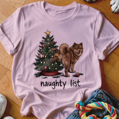 Pink t-shirt with a dog, Christmas tree, and "naughty list" text.
