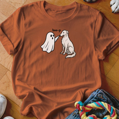 Orange t-shirt with cartoon ghost booping a white dog, text reads "boo-p".