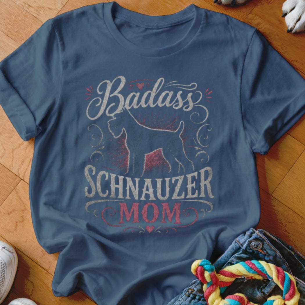 Dark blue t-shirt with "Badass SCHNAUZER MOM" text and silhouette.