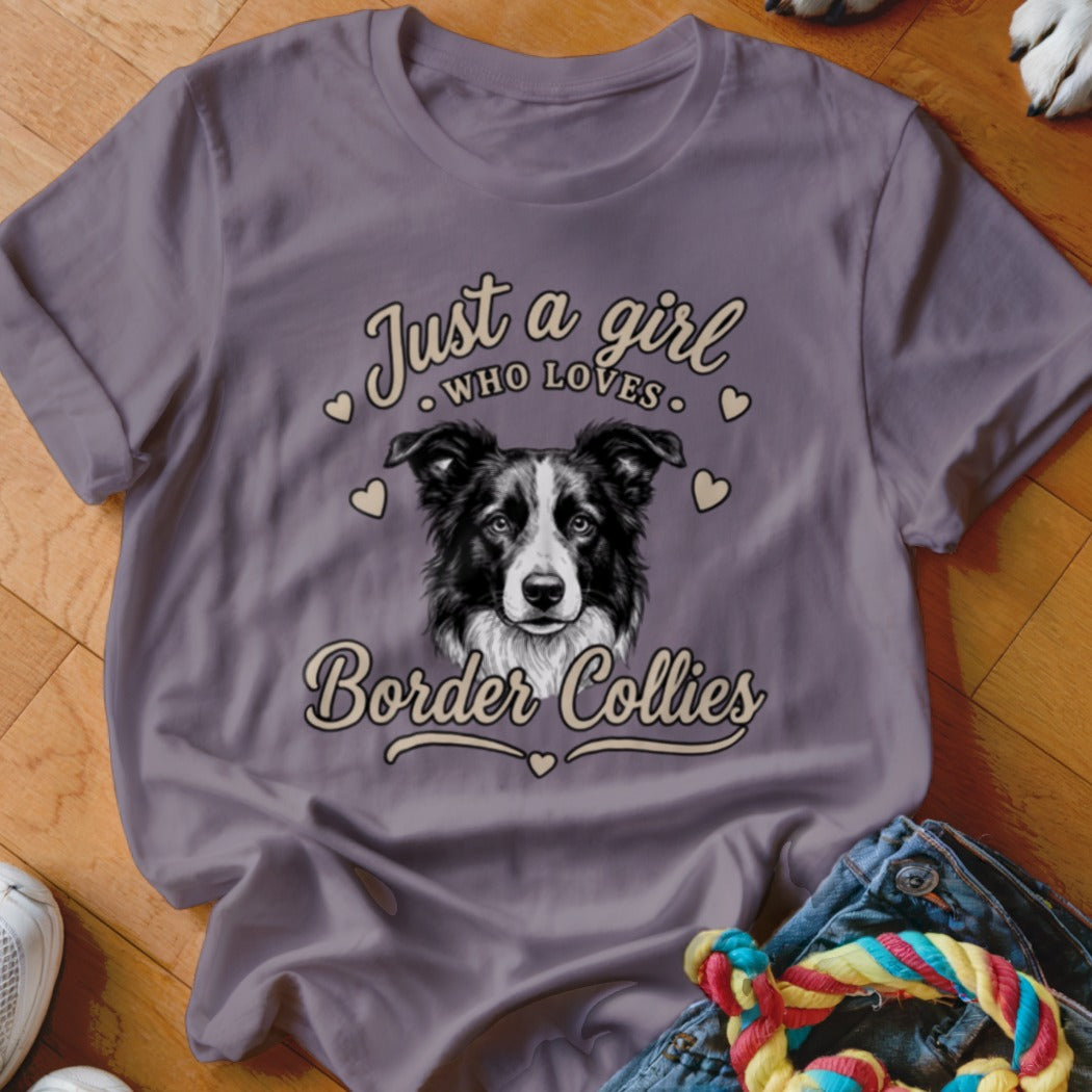 A purple t-shirt featuring a Border Collie graphic with the text Just a girl who loves Border Collies.