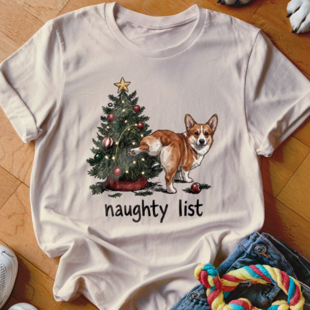 Corgi dog in front of a Christmas tree with the text "naughty list".