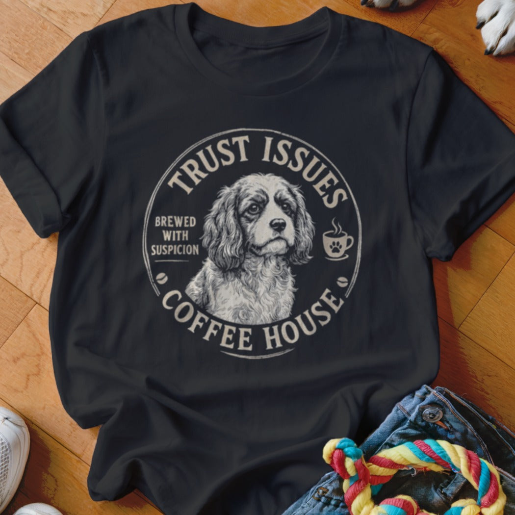 Black t-shirt with a distressed circular graphic of a dog and text "Trust Issues Coffee House".