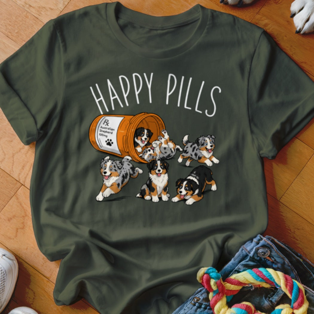 Australian Shepherd puppies spilling from an orange bottle labeled "HAPPY PILLS".