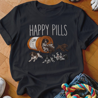 Black t-shirt with "HAPPY PILLS" text and puppies spilling from a pill bottle.