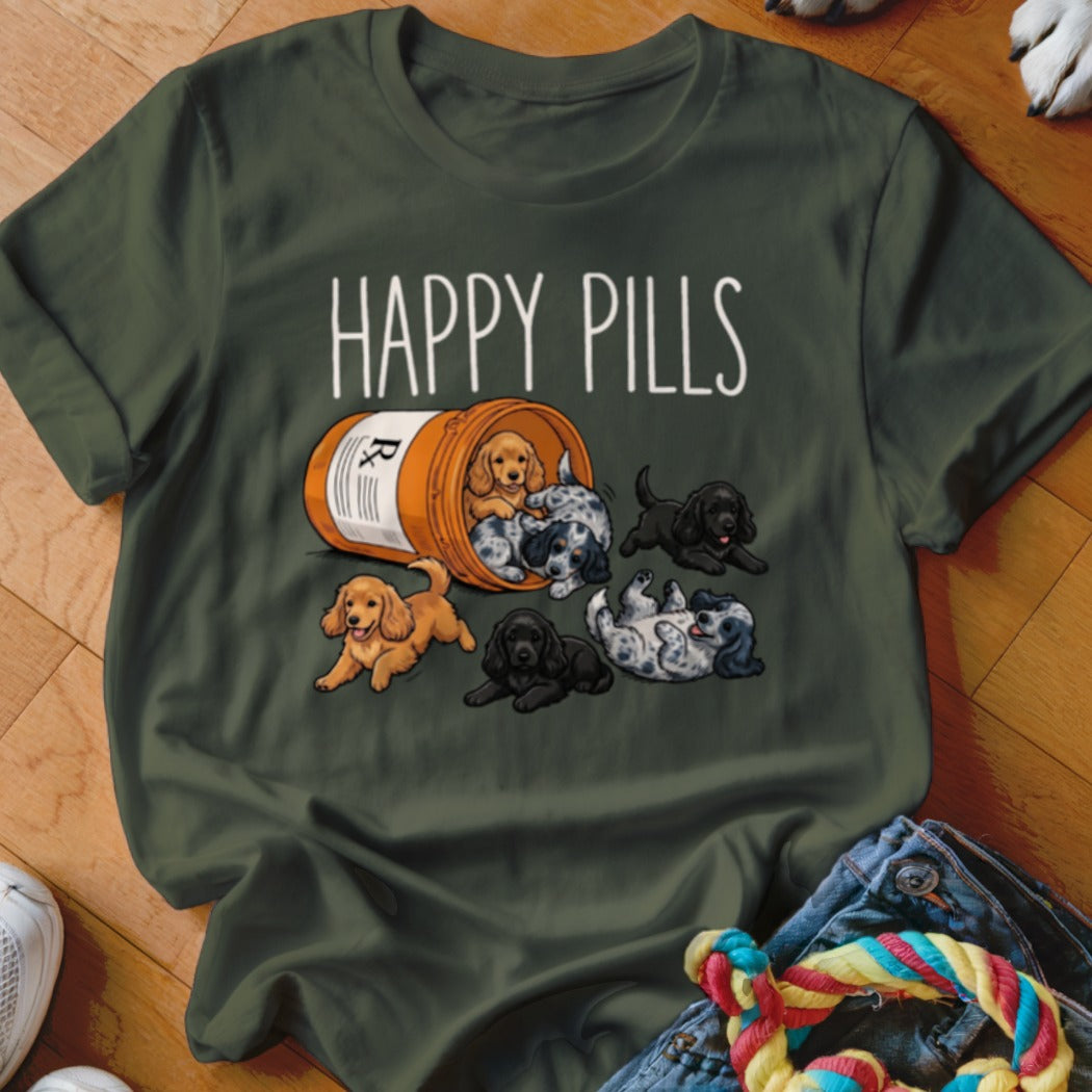 Green t-shirt with "HAPPY PILLS" and puppies spilling from a prescription bottle.