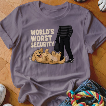 A grey t-shirt featuring a cartoon of a happy golden retriever rolling on its back while a burglar sneaks by, with the text WORLD'S WORST SECURITY.