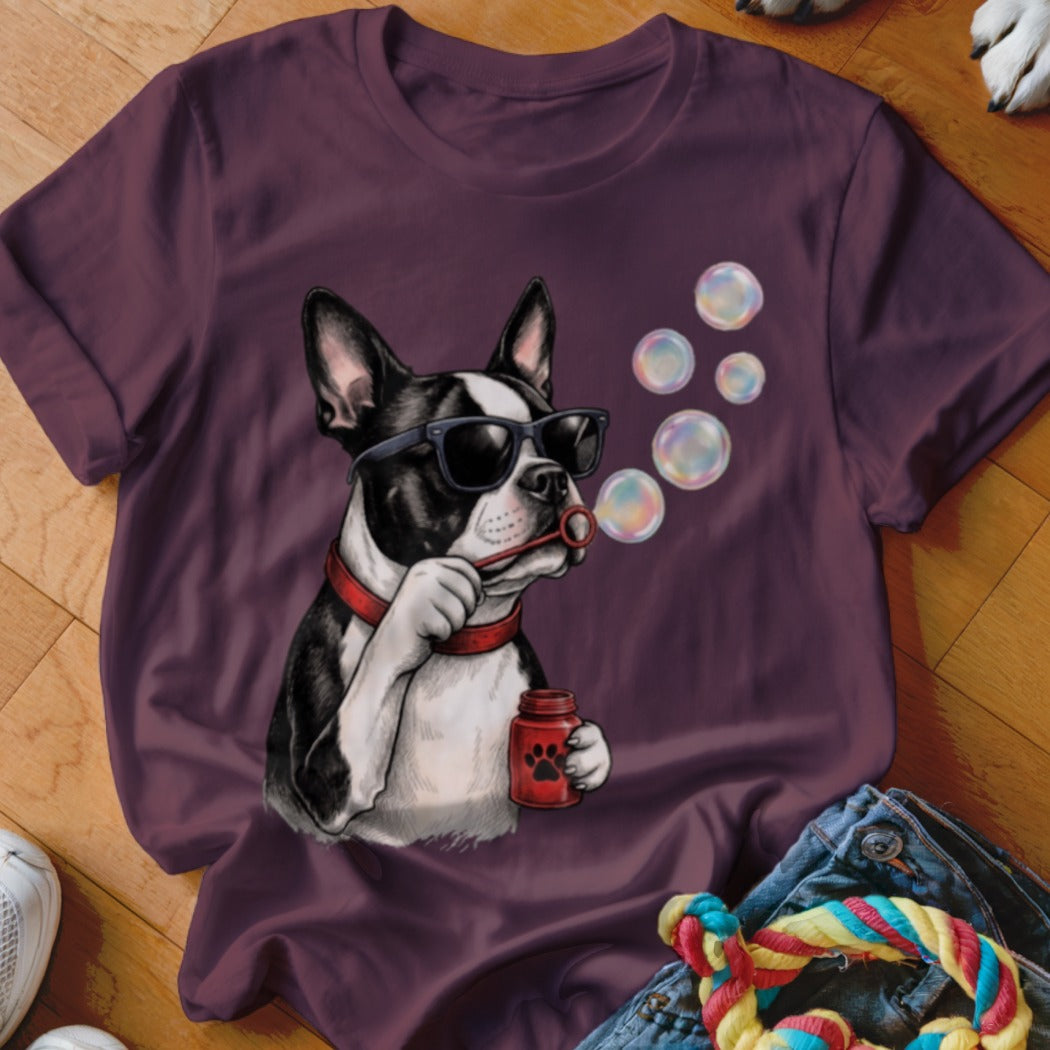 Plum t-shirt featuring a Boston Terrier wearing sunglasses and blowing soap bubbles.
