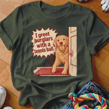 Golden retriever with tennis ball, text says "I greet burglars with a tennis ball."