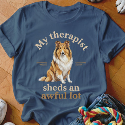 Blue t-shirt with a Collie dog graphic and text "My therapist sheds an awful lot".