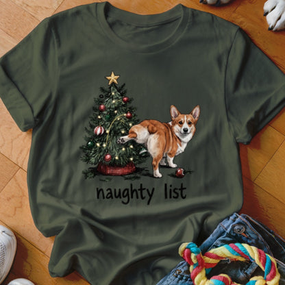 Green t-shirt with a corgi next to a decorated Christmas tree and "naughty list" text.