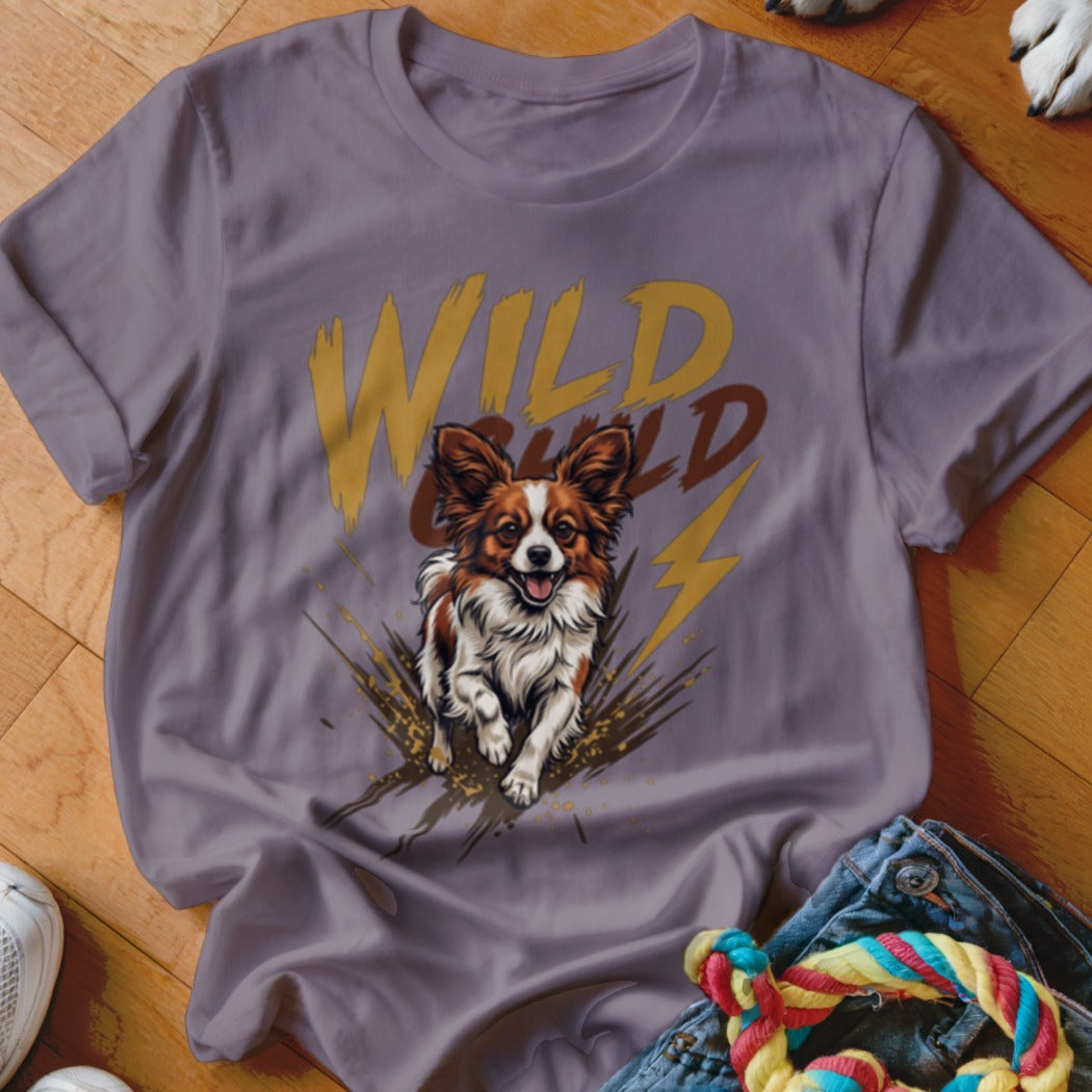 Purple t-shirt featuring a graphic of a running Papillon dog and the text Wild Child.