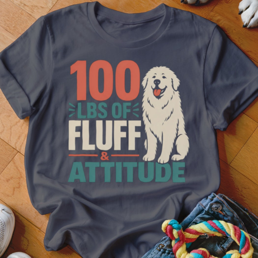 Dark blue t-shirt with white fluffy dog and text "100 LBS OF FLUFF & ATTITUDE".