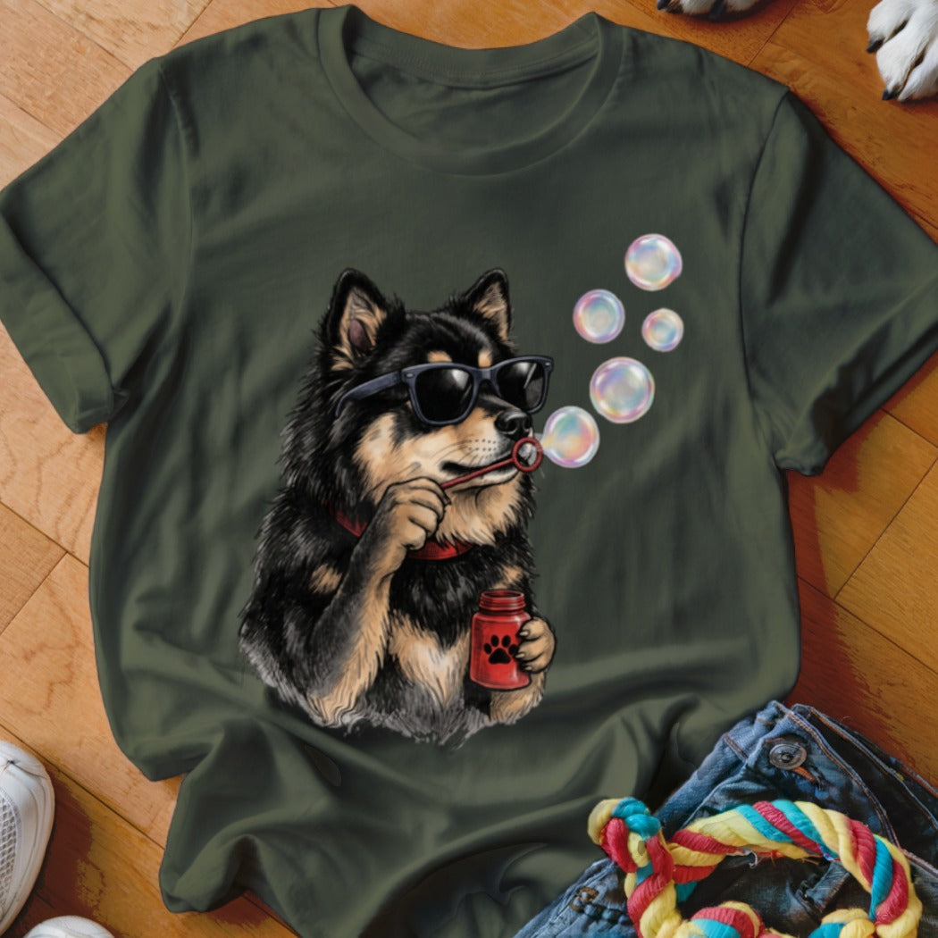 Dark green t-shirt featuring a graphic of a black and tan dog wearing sunglasses and blowing bubbles.