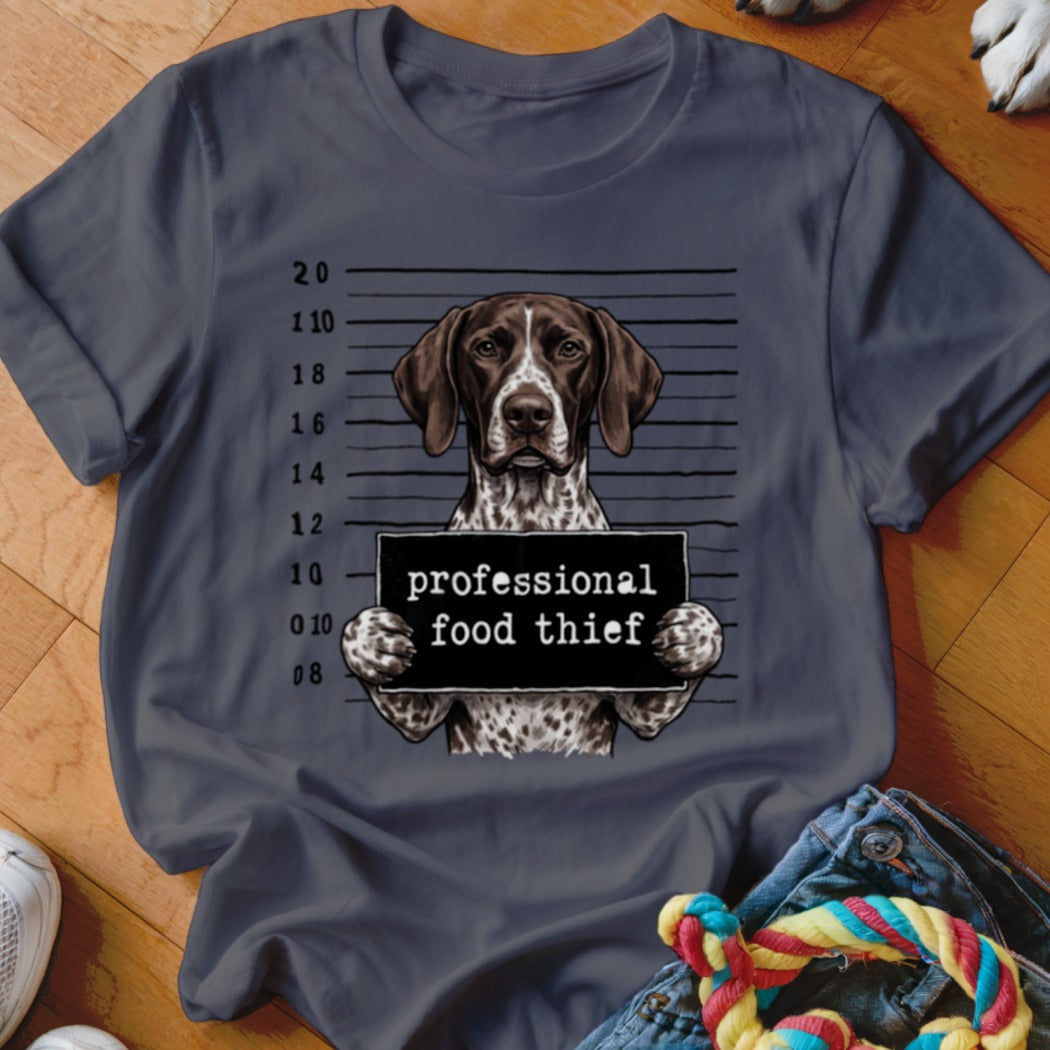 German Shorthaired Pointer mugshot with "professional food thief" sign.
