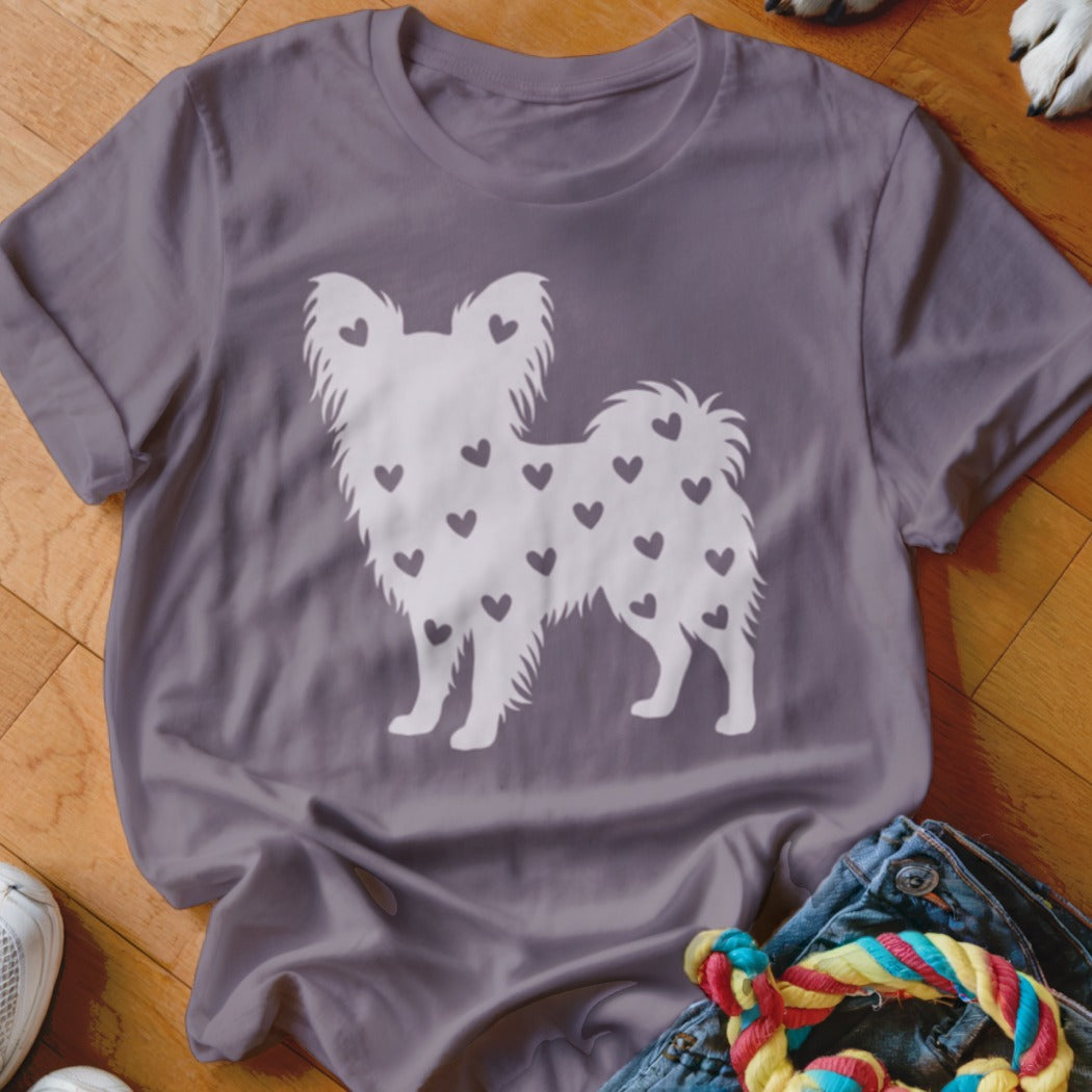 Purple t-shirt with a white silhouette of a dog covered in hearts.