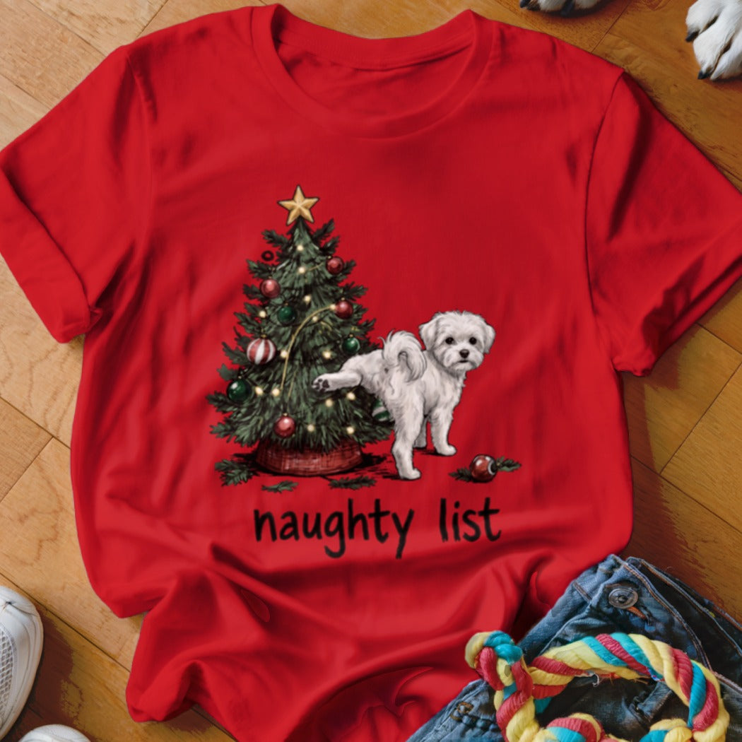 Red t-shirt with a Christmas tree and a white dog, reading "naughty list".