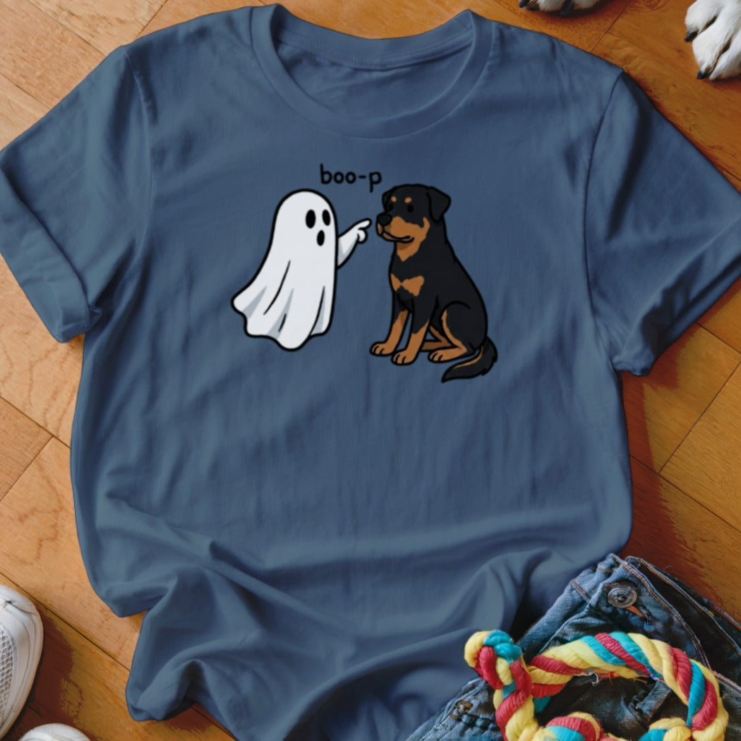 Cartoon ghost playfully booping a Rottweiler with the text "boo-p".