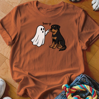 Ghost booping a Rottweiler dog with "boo-p" text on an orange t-shirt.