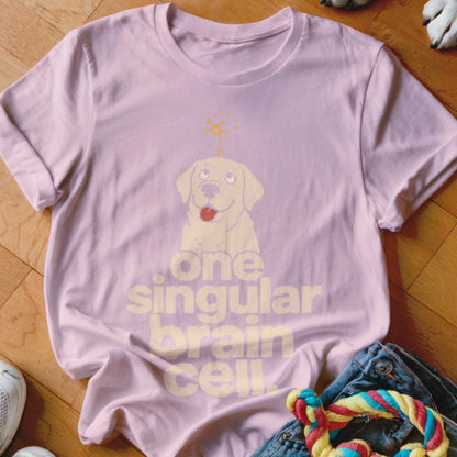Light pink t-shirt with a yellow cartoon dog and text "one singular brain cell".