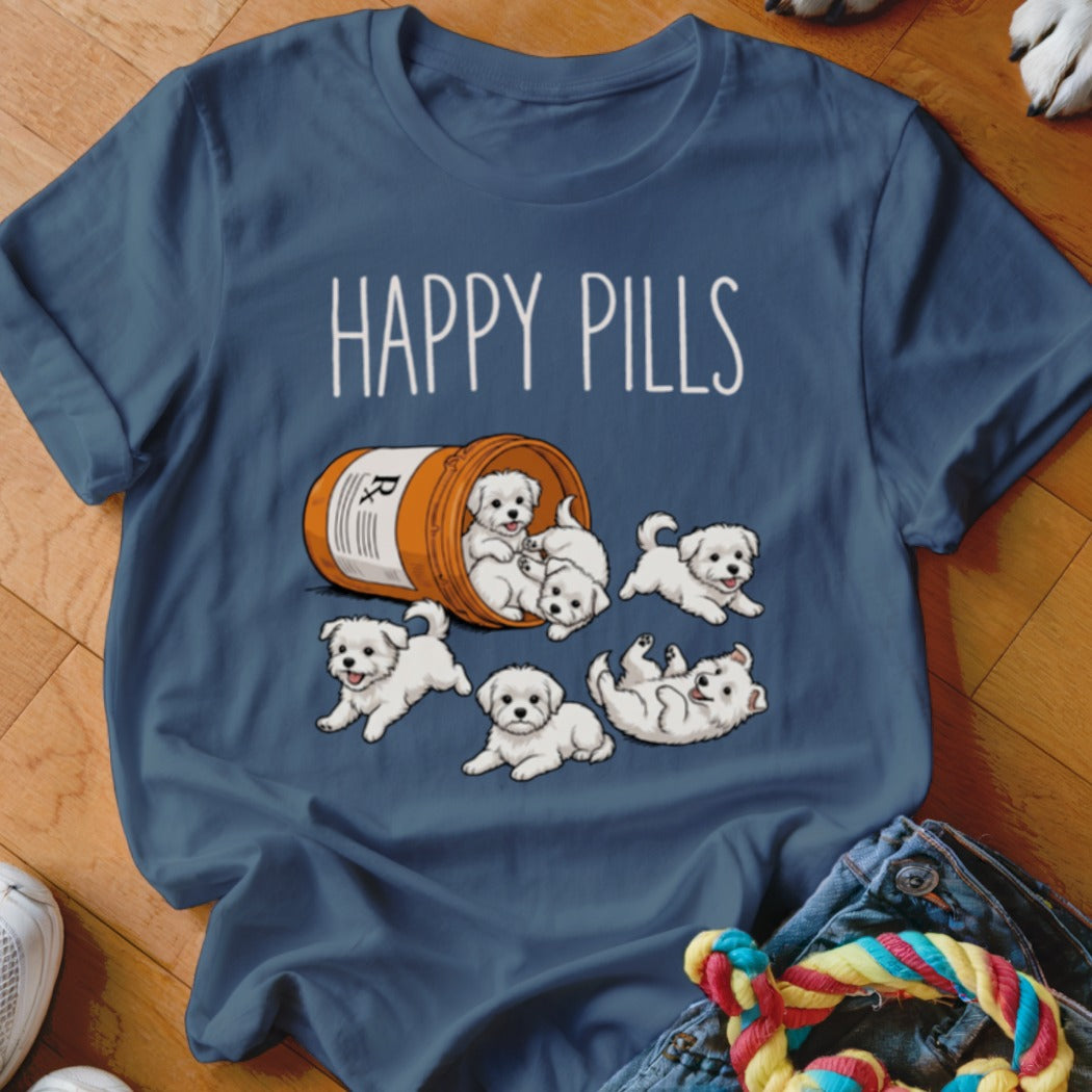 T-shirt with "HAPPY PILLS" text and playful Maltese puppies spilling from a prescription bottle.