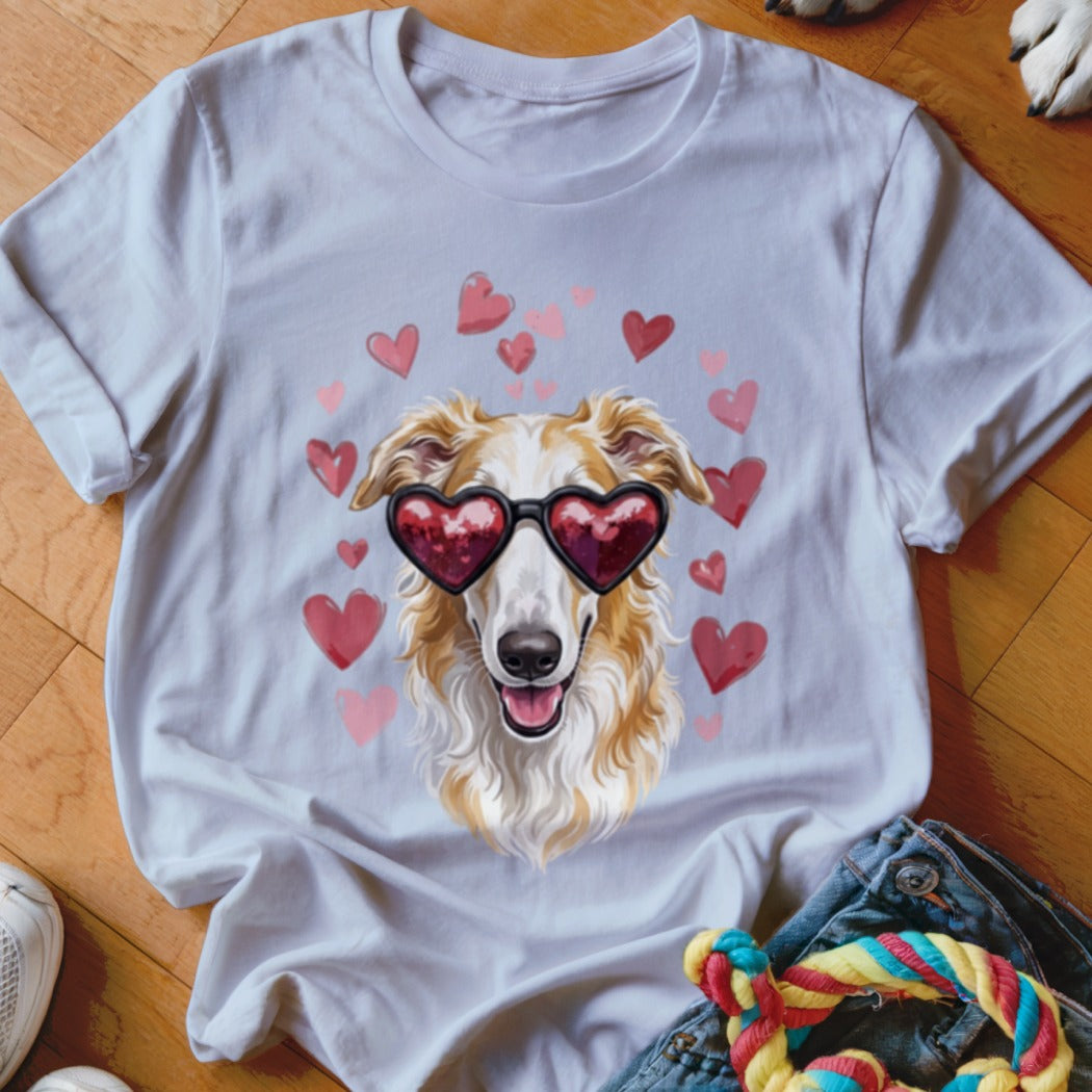 A white crewneck t-shirt featuring a graphic of a tan dog wearing heart-shaped sunglasses surrounded by pink hearts.