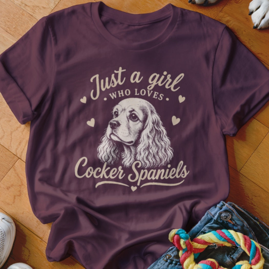 Maroon t-shirt with "Just a girl who loves Cocker Spaniels" and dog illustration.