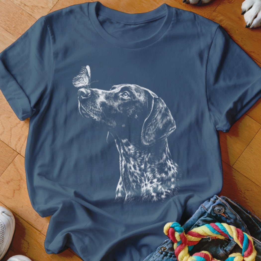Navy blue short-sleeve t-shirt printed with a white sketch of a dog looking at a butterfly.