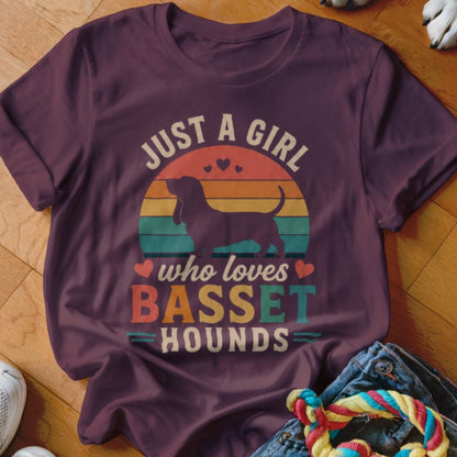 Maroon t-shirt with "Just a Girl who loves Basset Hounds" text and dog silhouette.