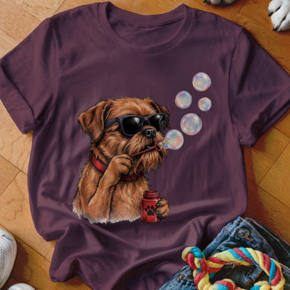 Maroon crewneck t-shirt featuring an illustration of a brown dog wearing sunglasses blowing bubbles.
