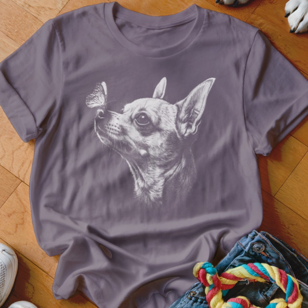 Purple crewneck t-shirt featuring a white sketch of a Chihuahua with a butterfly on its nose.