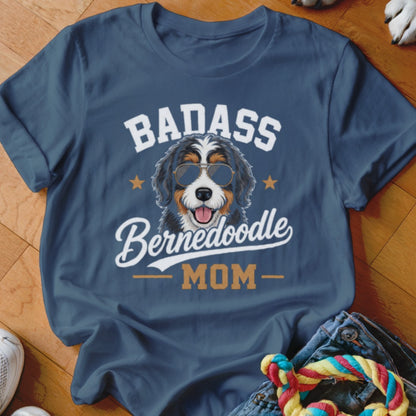 Bernedoodle mom wearing sunglasses with "Badass" text on a blue shirt.