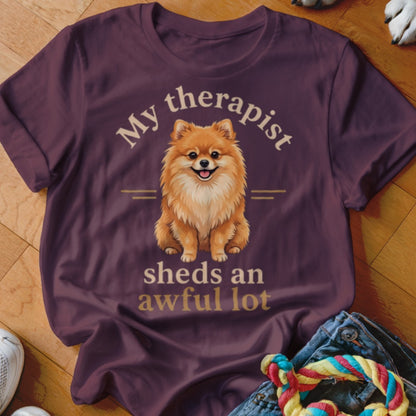 T-shirt with Pomeranian dog graphic and text "My therapist sheds an awful lot."