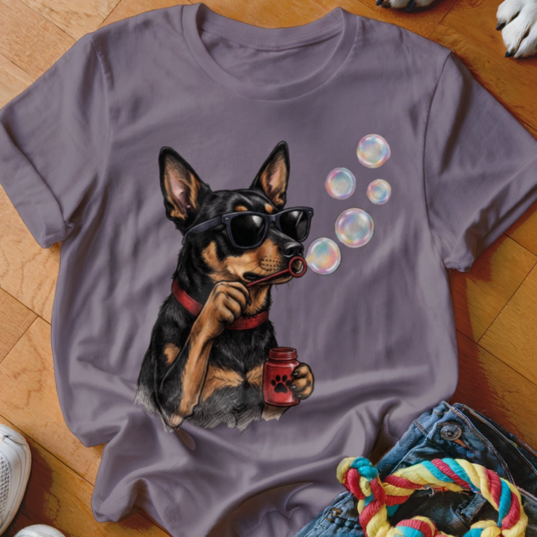 Grey crewneck t-shirt featuring a graphic of a black and tan dog wearing sunglasses and blowing bubbles.