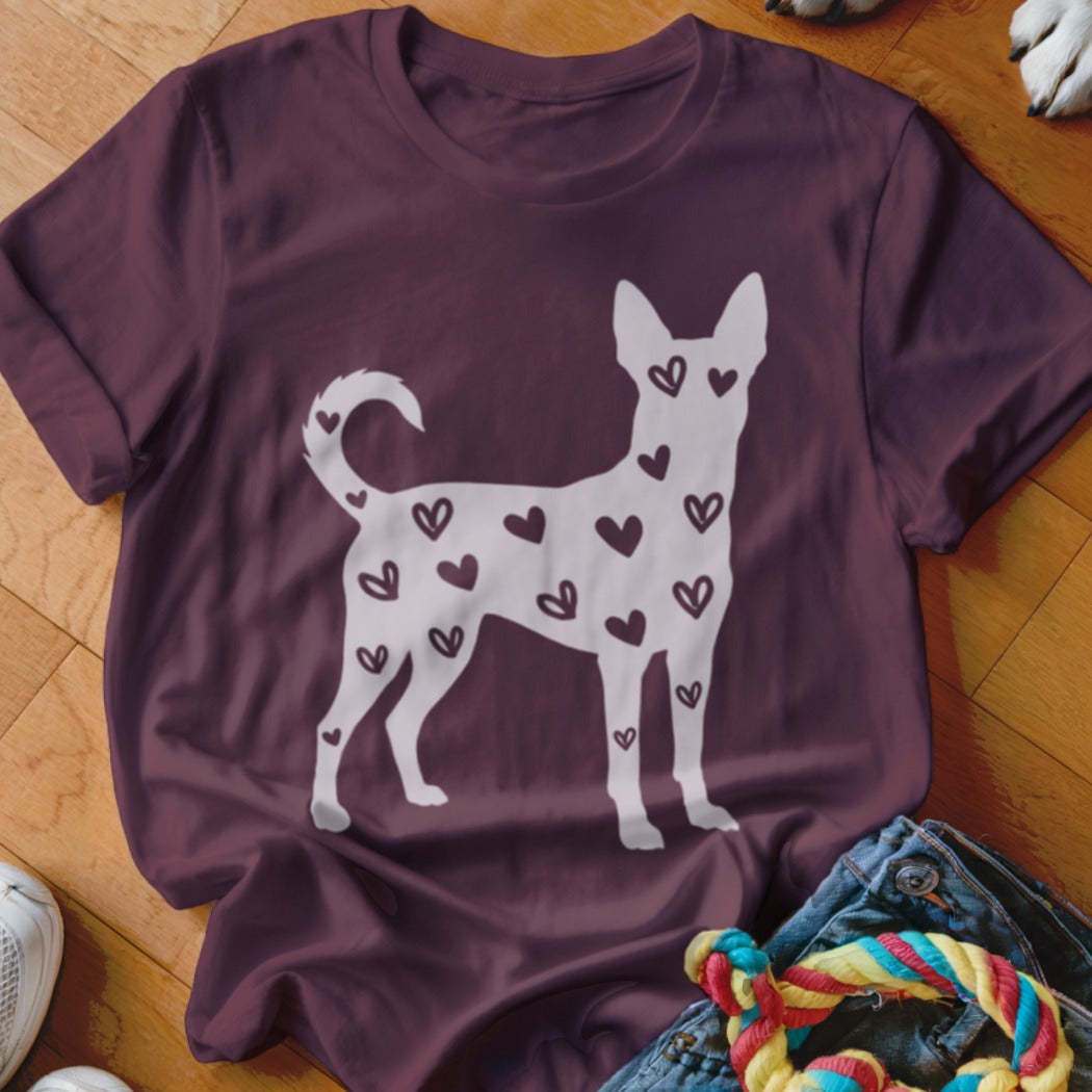 Burgundy t-shirt with a white dog silhouette filled with small dark hearts.