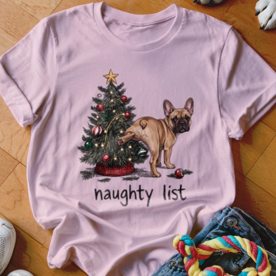 French bulldog near Christmas tree with text "naughty list"