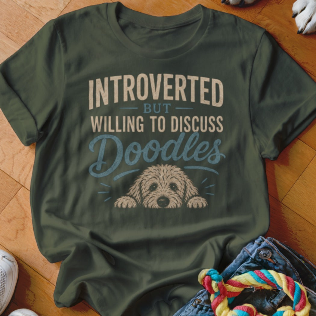 Green t-shirt with text "INTROVERTED BUT WILLING TO DISCUSS Doodles" and a doodle dog.