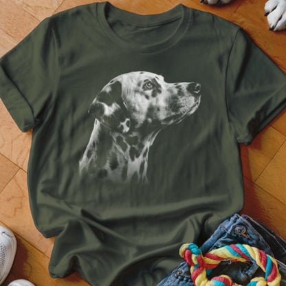 Dalmatian dog portrait on a green t-shirt, with jeans and toy below.
