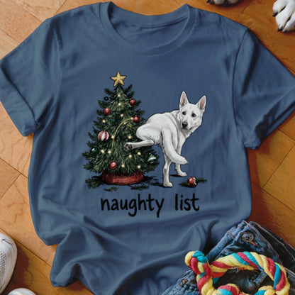 White German Shepherd near Christmas tree with text "naughty list"
