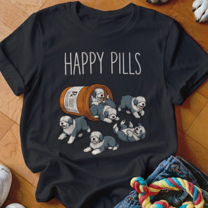 T-shirt with "Happy Pills" text and cartoon Old English Sheepdogs spilling from a pill bottle.