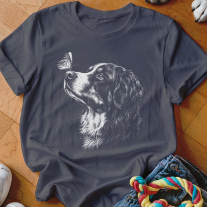 Dark gray t-shirt featuring a white line drawing of a dog looking at a butterfly.