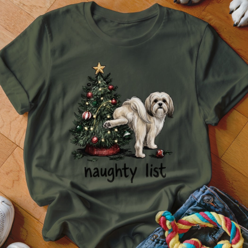 Green t-shirt with a Shih Tzu dog lifting its leg on a Christmas tree, "naughty list" text.