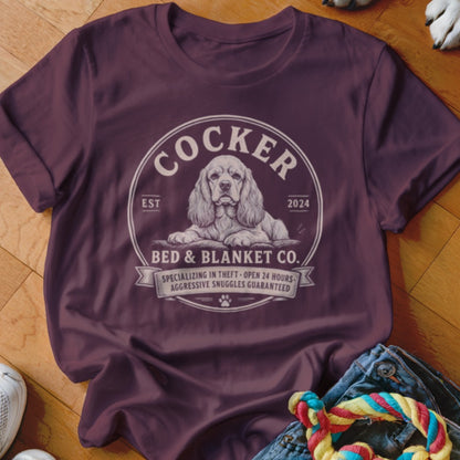 Maroon t-shirt with Cocker Bed & Blanket Co. graphic featuring a cocker spaniel.