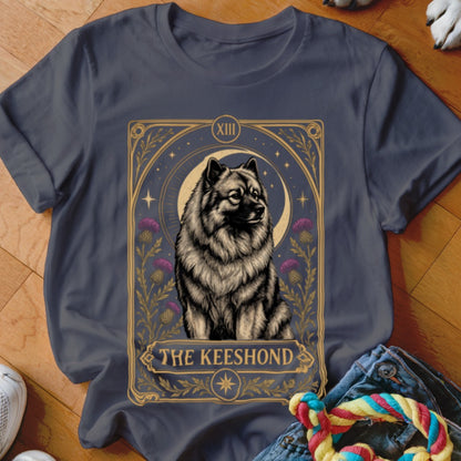 Dark gray t-shirt featuring a tarot card graphic of a Keeshond dog with the text The Keeshond.