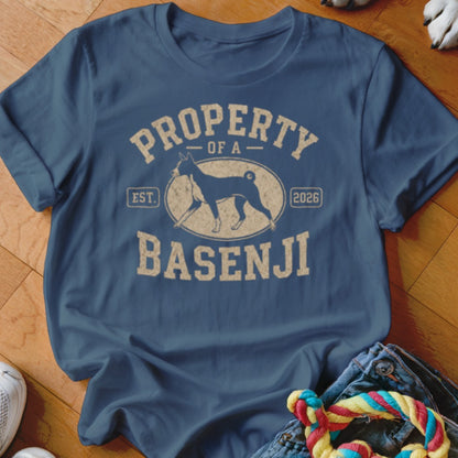 Blue t-shirt with text "PROPERTY OF A BASENJI" and a dog silhouette.